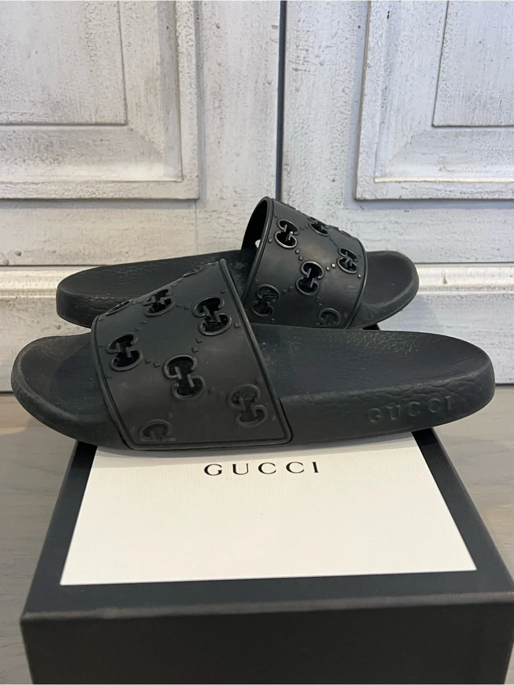 Gucci Black Embossed GG Rubber Slide Sandals